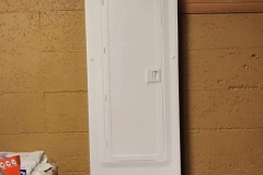 Recessed electrical panel installed in a finished wall