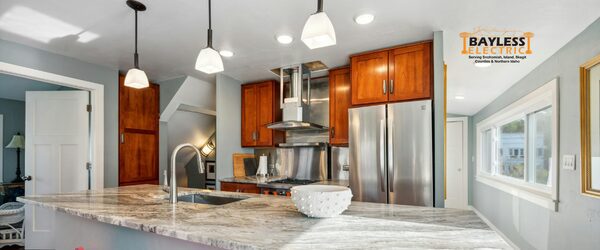 Kitchen lighting and appliances in a home with flickering lights